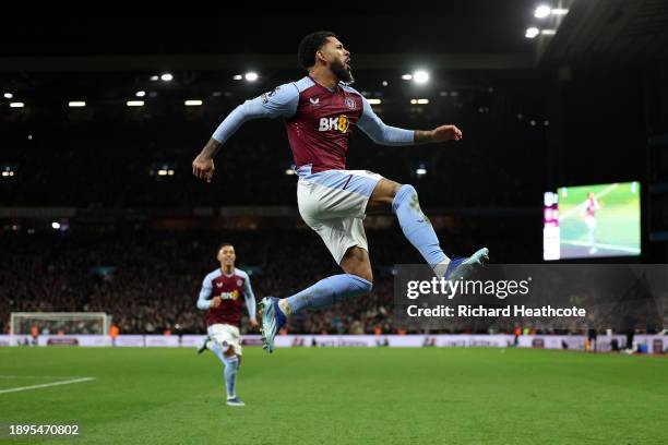 Douglas Luiz of Aston Villa celebrates scoring their team's third goal from the penalty-spot during the Premier League match between Aston Villa and...