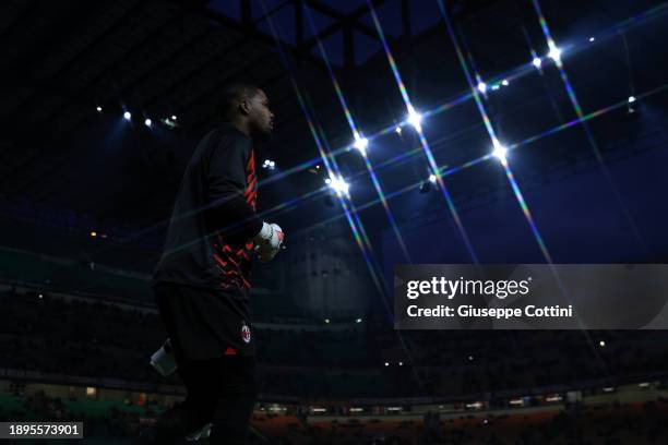 Mike Maignan of AC Milan looks on prior to the Serie A TIM match between AC Milan and US Sassuolo at Stadio Giuseppe Meazza on December 30, 2023 in...
