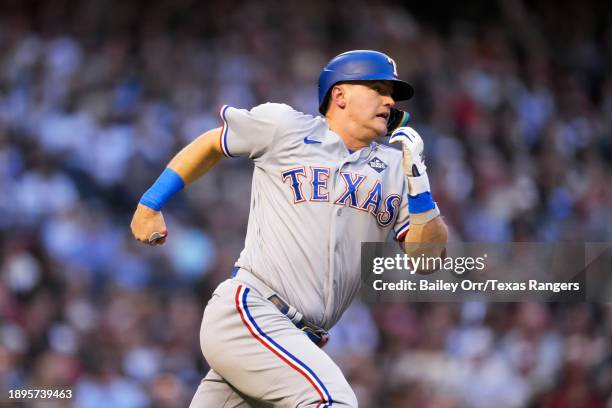 Josh Jung of the Texas Rangers rounds the bases during Game Four of the World Series against the Arizona Diamondbacks at Chase Field on October 31,...