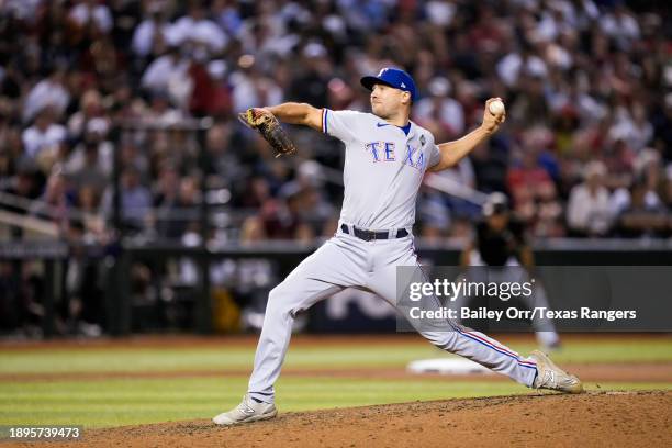 Brock Burke of the Texas Rangers pitches during Game Four of the World Series against the Arizona Diamondbacks at Chase Field on October 31, 2023 in...