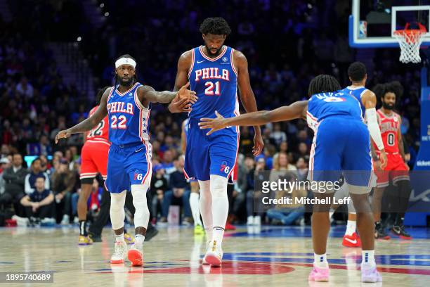 Patrick Beverley of the Philadelphia 76ers celebrates with Joel Embiid and Tyrese Maxey against the Chicago Bulls in the second quarter at the Wells...