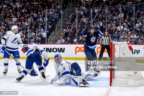 Vladislav Namestnikov of the Winnipeg Jets celebrates a second period goal by teammate Alex Iafallo against the Tampa Bay Lightning at the Canada...