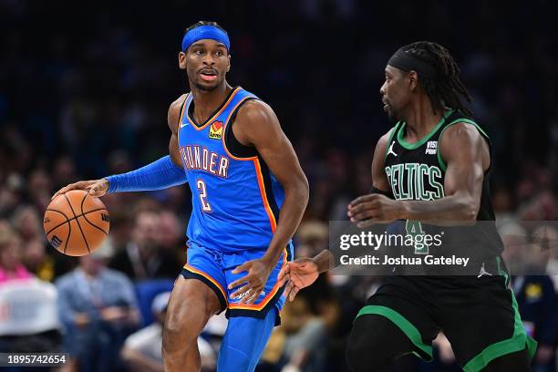 Shai Gilgeous-Alexander of the Oklahoma City Thunder handles the ball during the second half against the Boston Celtics at Paycom Center on January...