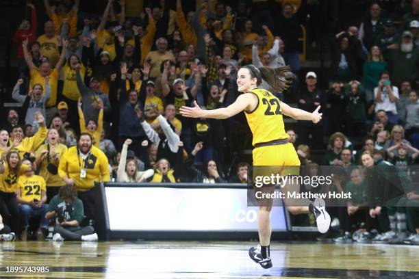 Guard Caitlin Clark of the Iowa Hawkeyes celebrates after scoring the game winning shot in the closing seconds of the second half against the...