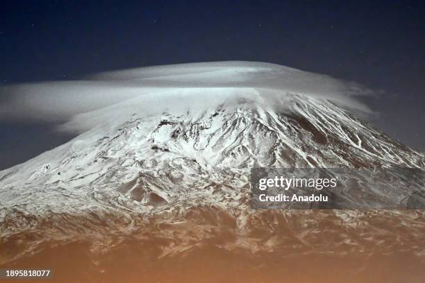 Lenticular cloud appears over the snow covered Mount Ararat in Igdir, Turkiye on December 28, 2023.