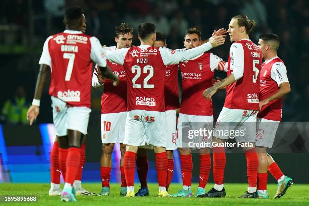 Joao Moutinho of SC Braga celebrates with teammates after scoring a goal during the Liga Portugal Betclic match between Casa Pia AC and SC Braga at...