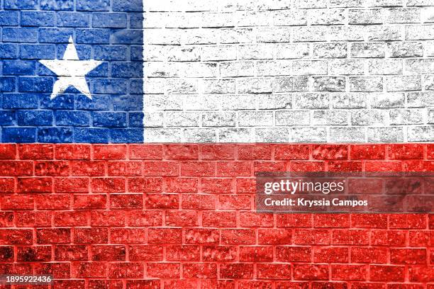 flag of chile painting on brick wall - viña del mar stock pictures, royalty-free photos & images