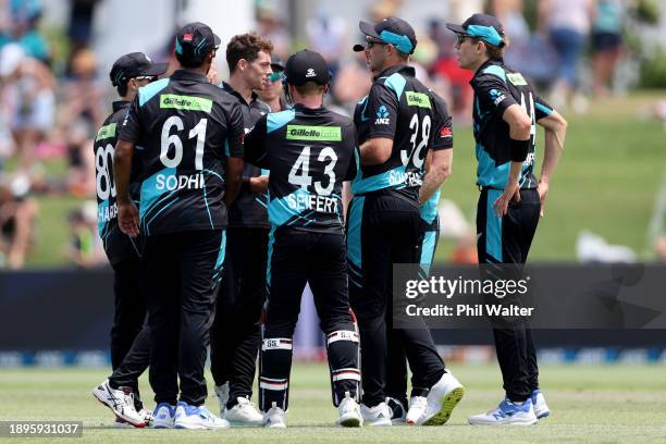 Mitchell Santner of New Zealand celebrates the wicket of Shamim Hossain of Bangladesh during game three of the Men's T20 International series between...