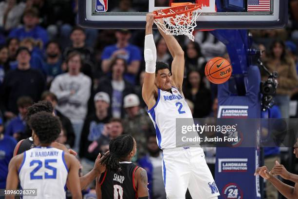 Nick Jourdain of the Memphis Tigers dunks during the second half against the Austin Peay Governors at FedExForum on December 30, 2023 in Memphis,...