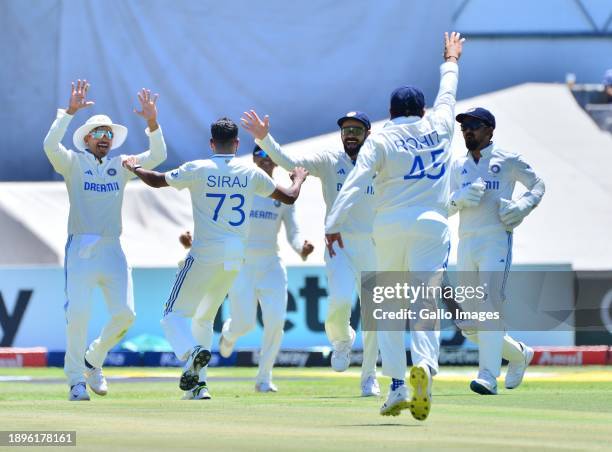 Mohammed Siraj of India celebrates the wicket of David Bedingham of South Africa with team mates during day 1 of the 2nd Test match between South...