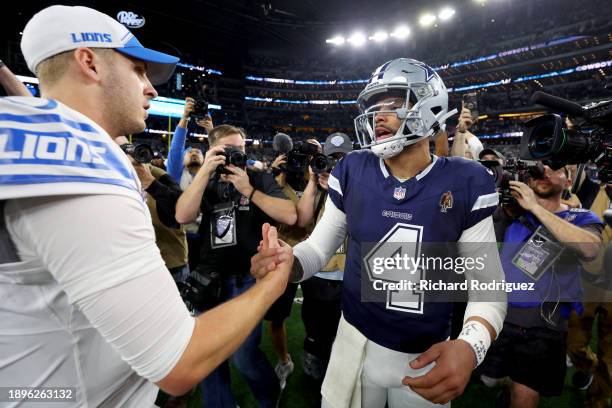 Jared Goff of the Detroit Lions congratulates Dak Prescott of the Dallas Cowboys after the game at AT&T Stadium on December 30, 2023 in Arlington,...