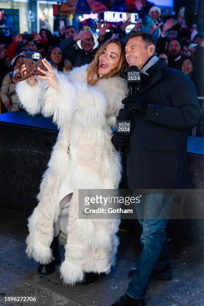 Rita Ora and Ryan Seacrest are seen rehearsing for "Dick Clark's New Year's Rockin' Eve" in Times Square on December 30, 2023 in New York City.