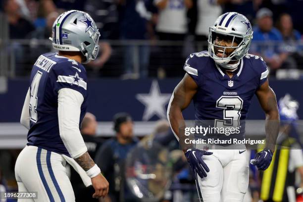 Brandin Cooks of the Dallas Cowboys celebrates with Dak Prescott after scoring a touchdown against the Detroit Lions during the fourth quarter in the...