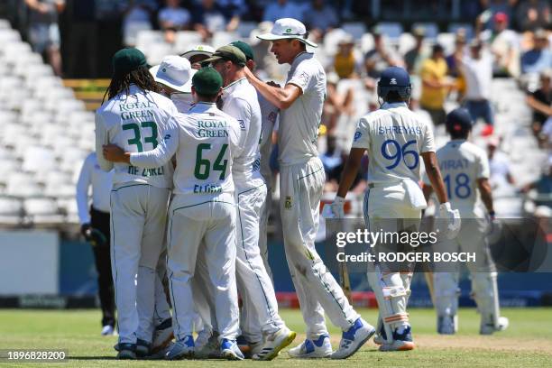 South African players celebrate after the dismissal of India's Shreyas Iyer during the first day of the second cricket Test match between South...