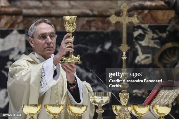 Archbishop and former personal secretary of Pope Benedict XVI, Georg Gänswein, presides over a special mass in St. Peter’s Basilica to mark the first...