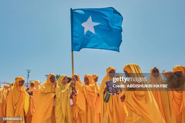 Students wave a Somali flag during a demonstration in support of Somalia's government following the port deal signed between Ethiopia and the...