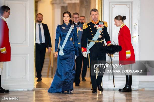 Crown Prince Frederik of Denmark and Crown Princess Mary of Denmark arrive to greet the diplomatic corps during a New Year reception at...