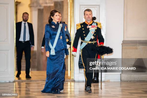 Crown Prince Frederik of Denmark and Crown Princess Mary of Denmark arrive to greet the diplomatic corps during a New Year reception at...