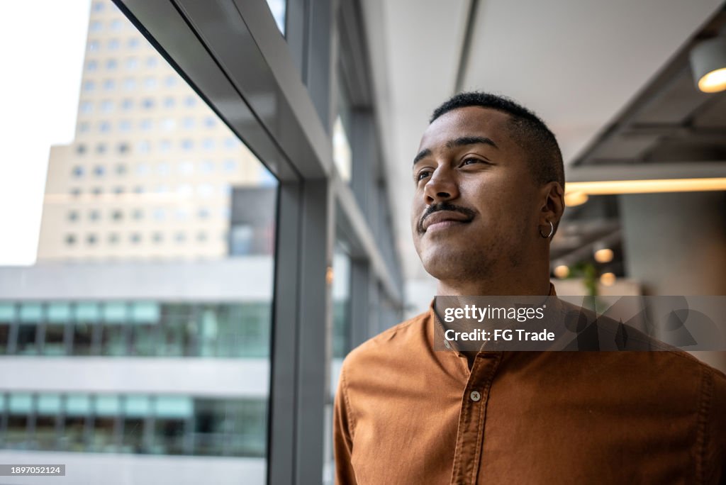 Businessman contemplating on the office