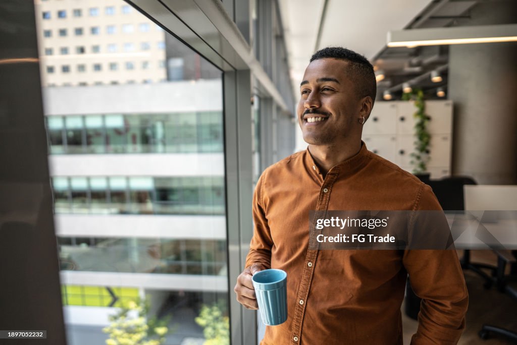 Businessman contemplating on the office
