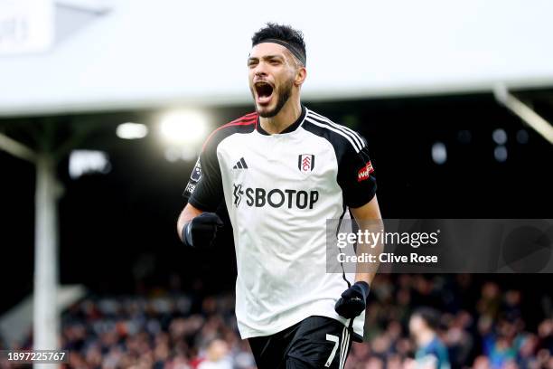 Raul Jimenez of Fulham celebrates after scoring their team's first goal during the Premier League match between Fulham FC and Arsenal FC at Craven...