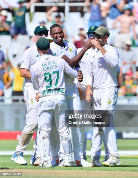 Lungi Ngidi of South Africa celebrates the wicket of Jasprit Bumrah of India with team mates during day 1 of the 2nd Test match between South Africa...