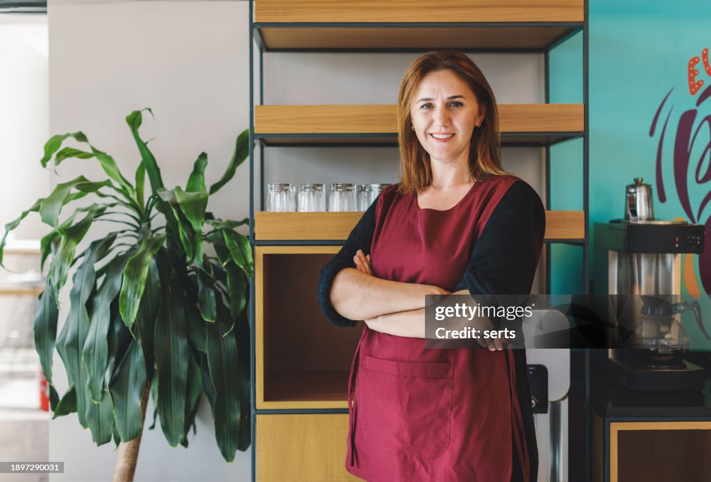 Happy Cafe Owner: Portrait of Smiling Business Woman in Coffee Shop