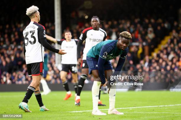 Bukayo Saka of Arsenal reacts after a missed chance during the Premier League match between Fulham FC and Arsenal FC at Craven Cottage on December...