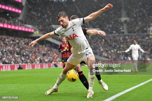 Ben Davies of Tottenham Hotspur is challenged by Ryan Christie of AFC Bournemouth during the Premier League match between Tottenham Hotspur and AFC...