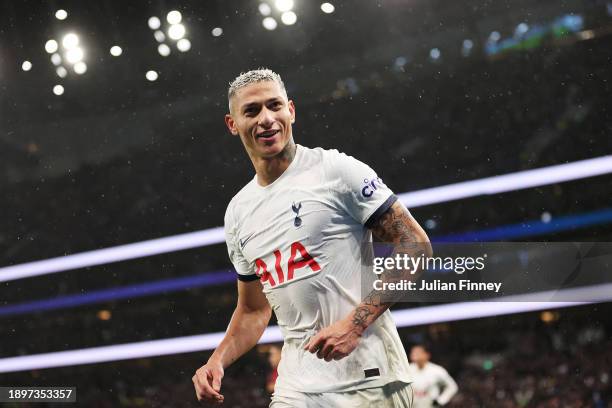 Richarlison of Tottenham Hotspur celebrates scoring their team's third goal during the Premier League match between Tottenham Hotspur and AFC...