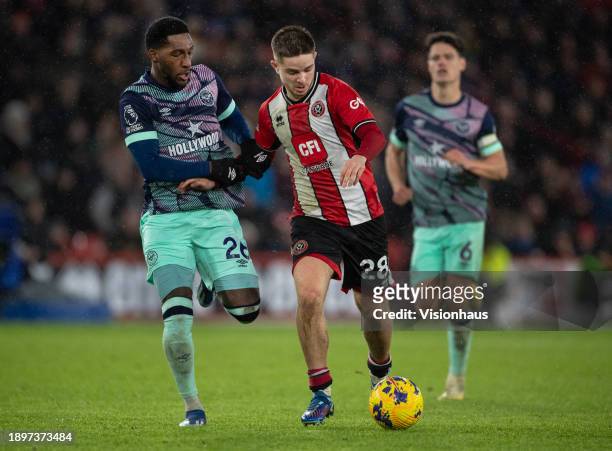 James McAtee of Sheffield United and Shandon Baptiste of Brentford in action during the Premier League match between Sheffield United and Brentford...