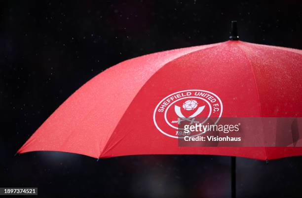 An umbrella with the Sheffield United club bade during the Premier League match between Sheffield United and Brentford FC at Bramall Lane on December...