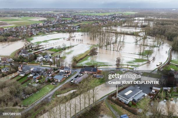 This aerial drone image shows floods after heavy rainfall in Zandbergen, Geraardsbergen on Wednesday 03 January 2024. BELGA PHOTO KURT DESPLENTER