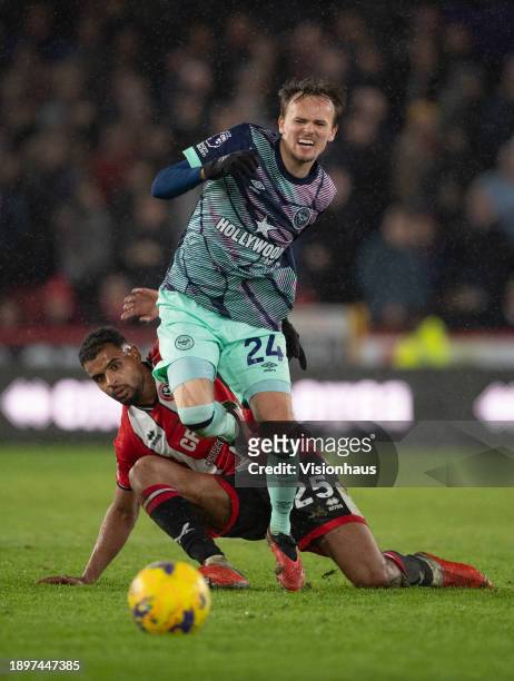Mikkel Damsgaard of Brentford in action with Ryan One of Sheffield United during the Premier League match between Sheffield United and Brentford FC...