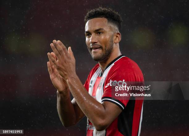 Auston Trusty of Sheffield United applauds the fans after the Premier League match between Sheffield United and Brentford FC at Bramall Lane on...
