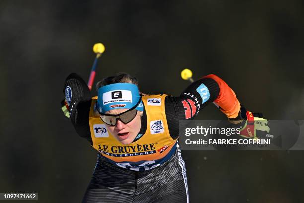 Germany's athlete Victoria Carl competes during the qualification of the cross-country skiing Women's Sprint Finale Free event at the FIS Tour de Ski...
