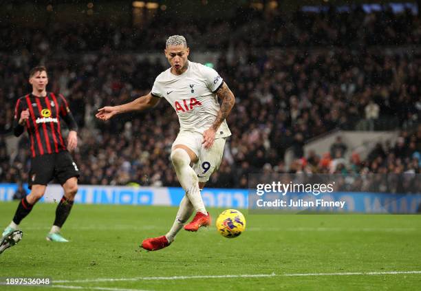 Richarlison of Tottenham Hotspur scores their team's third goal during the Premier League match between Tottenham Hotspur and AFC Bournemouth at...