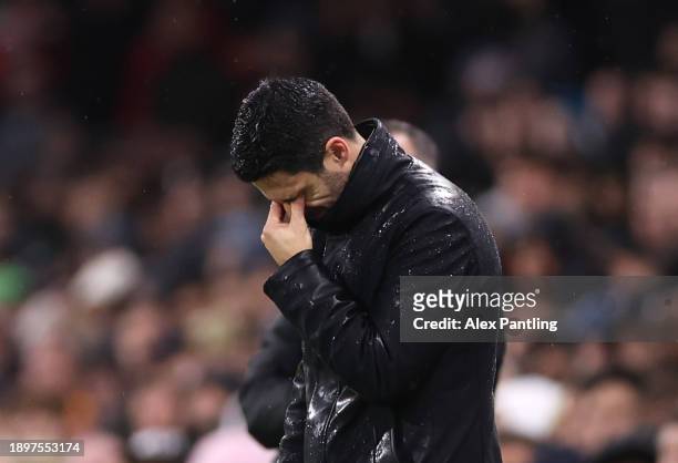 Mikel Arteta, Manager of Arsenal reacts during the Premier League match between Fulham FC and Arsenal FC at Craven Cottage on December 31, 2023 in...