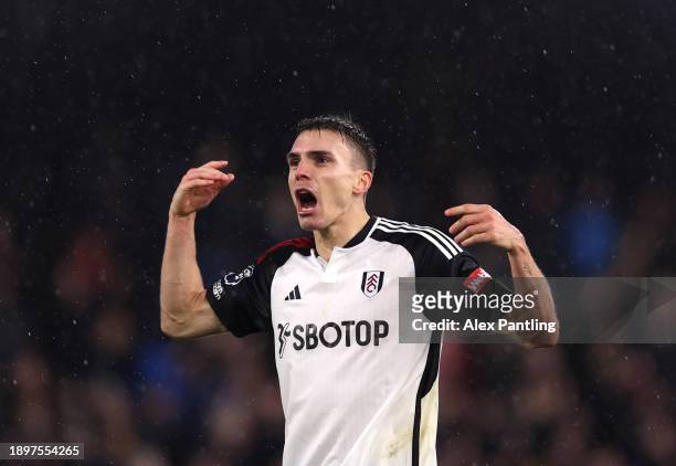 Joao Palhinha of Fulham celebrates at full-time during the Premier League match between Fulham FC and Arsenal FC at Craven Cottage on December 31,...