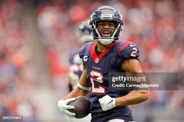 Robert Woods of the Houston Texans celebrates a first down during the first quarter of a game against the Tennessee Titans at NRG Stadium on December...