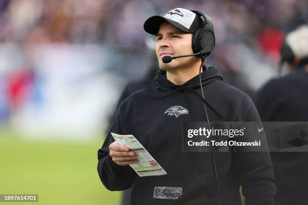 Defensive coordinator Mike Macdonald of the Baltimore Ravens looks on during the first half of the game against the Miami Dolphins at M&T Bank...