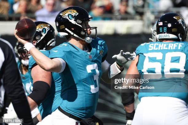 Beathard of the Jacksonville Jaguars attempts a pass during the first quarter against the Carolina Panthers at EverBank Stadium on December 31, 2023...