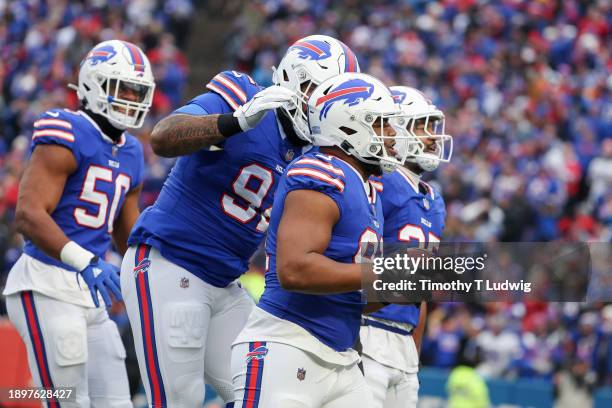 Ed Oliver of the Buffalo Bills celebrates a interception during the first quarter of a game against the New England Patriots at Highmark Stadium on...