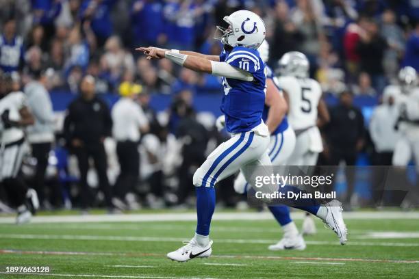 Gardner Minshew of the Indianapolis Colts celebrates after a touchdown pass during the second quarter against the Las Vegas Raiders at Lucas Oil...