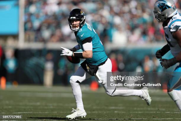 Beathard of the Jacksonville Jaguars during the first half against the Carolina Panthers at EverBank Stadium on December 31, 2023 in Jacksonville,...