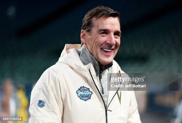 President of Hockey Operations George McPhee of the Vegas Golden Knights looks on before the 2024 Discover NHL Winter Classic team practice at...