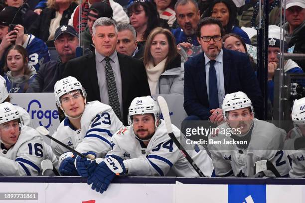 Head coach Sheldon Keefe and assistant coach Dean Chynoweth of the Toronto Maple Leafs follow gameplay during the third period of a game against the...