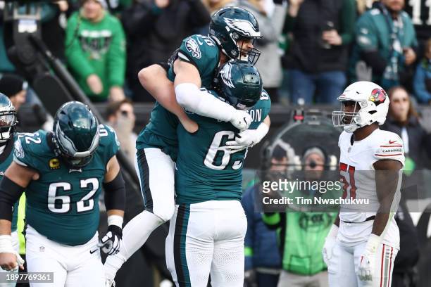 Dallas Goedert celebrates a touchdown with Brandon Graham of the Philadelphia Eagles after a touchdown during the fourth quarter against the Arizona...