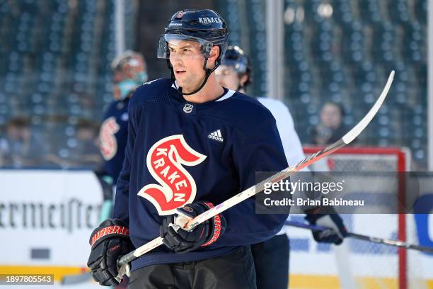 Brian Dumoulin of the Seattle Kraken looks on during the 2024 Discover NHL Winter Classic team practice at T-Mobile Park on December 31, 2023 in...