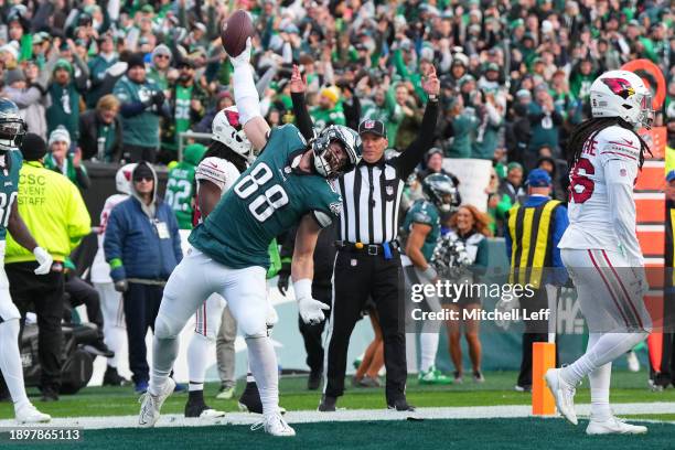 Dallas Goedert of the Philadelphia Eagles spikes the ball after scoring a touchdown during the fourth quarter against the Arizona Cardinals at...